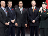 Hockey Hall of Fame inductees Mark Messier, Ron Francis, Scott Stevens and Al MacInnis look on as Canadian Forces Pte. Scott Newlands sings the national anthem during pre-game ceremonies prior to the Toronto Maple Leafs and New York Rangers game in Toronto on Saturday, Nov.10, 2007. (CP / Adrian Wyld)